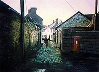 Painting of Market Street in Laugharne, Wales